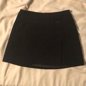 Bebe short black skirt